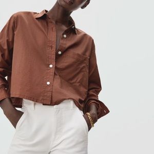 everlane silky cotton way-short cropped button down shirt in the color cinnamon